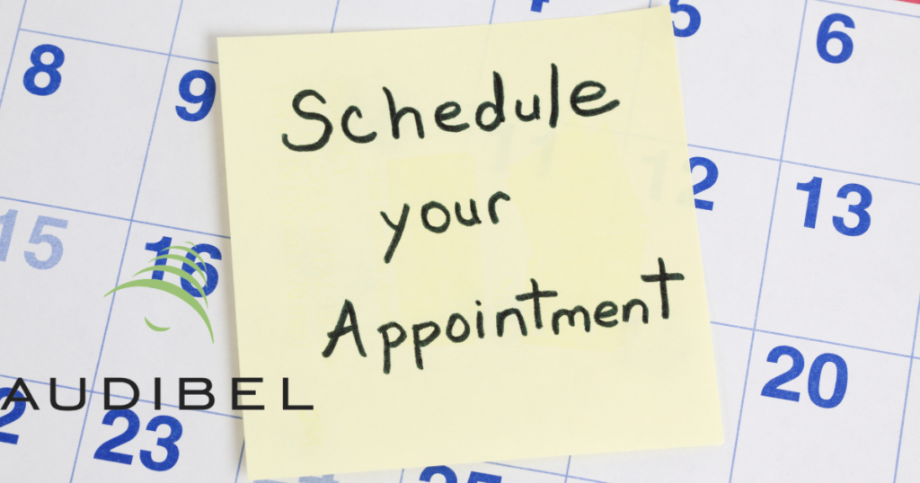 calendar with a post it note about scheduling an appointment
