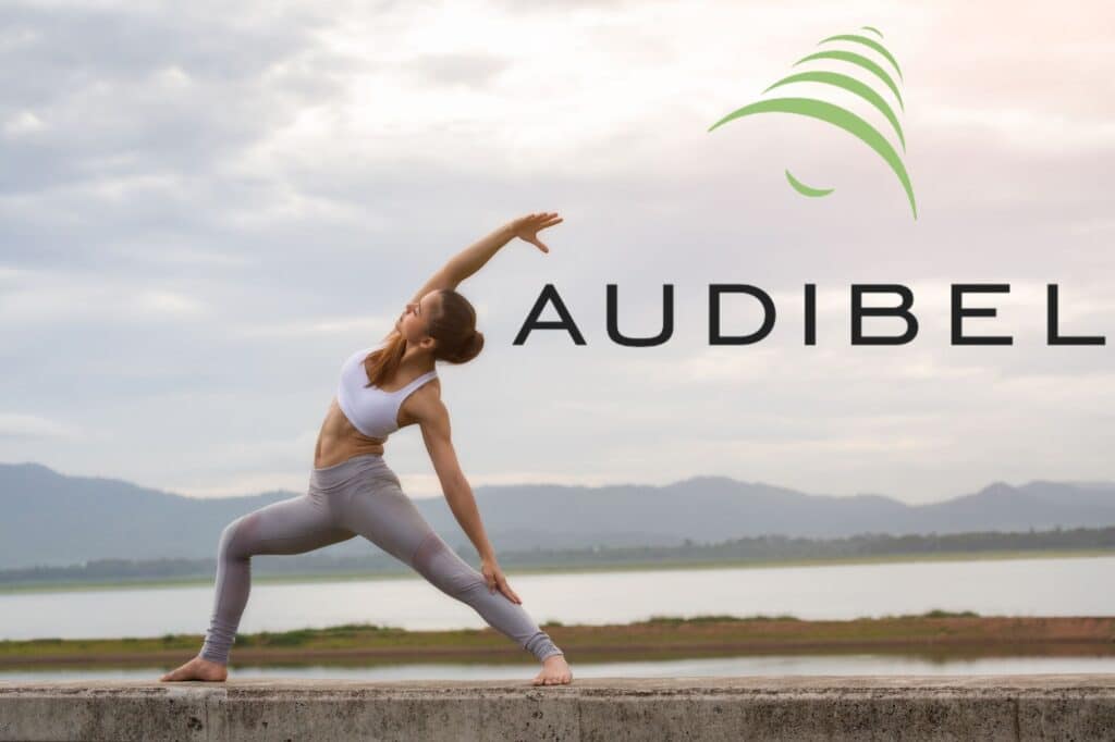 woman doing yoga on the shore